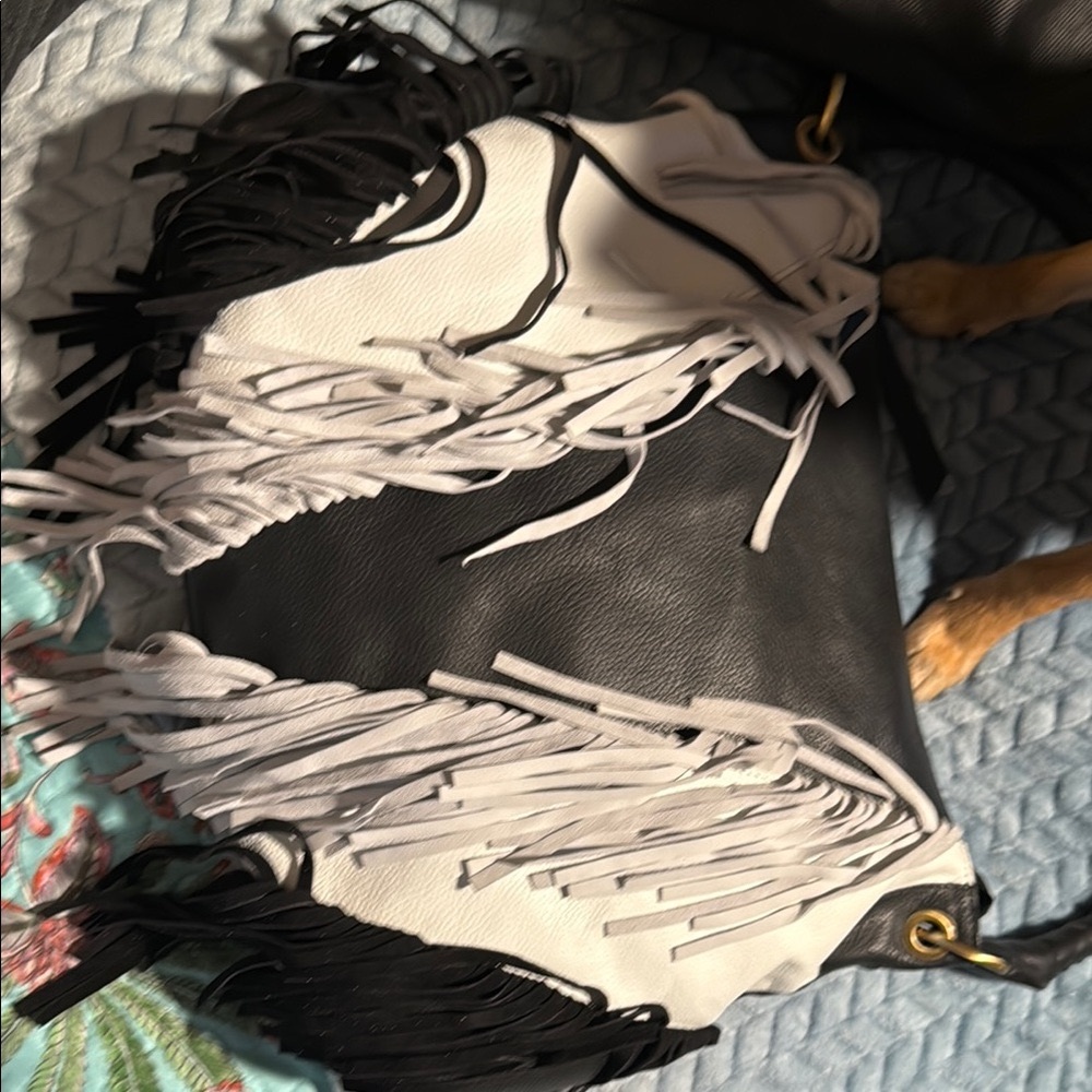 Black and White Fringe Bag Sherif brand never used . Super cute with a boho vibe